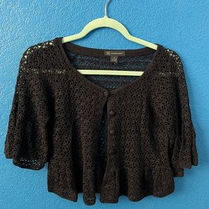Super cute black crocheted button up top. Size small and made by INC.